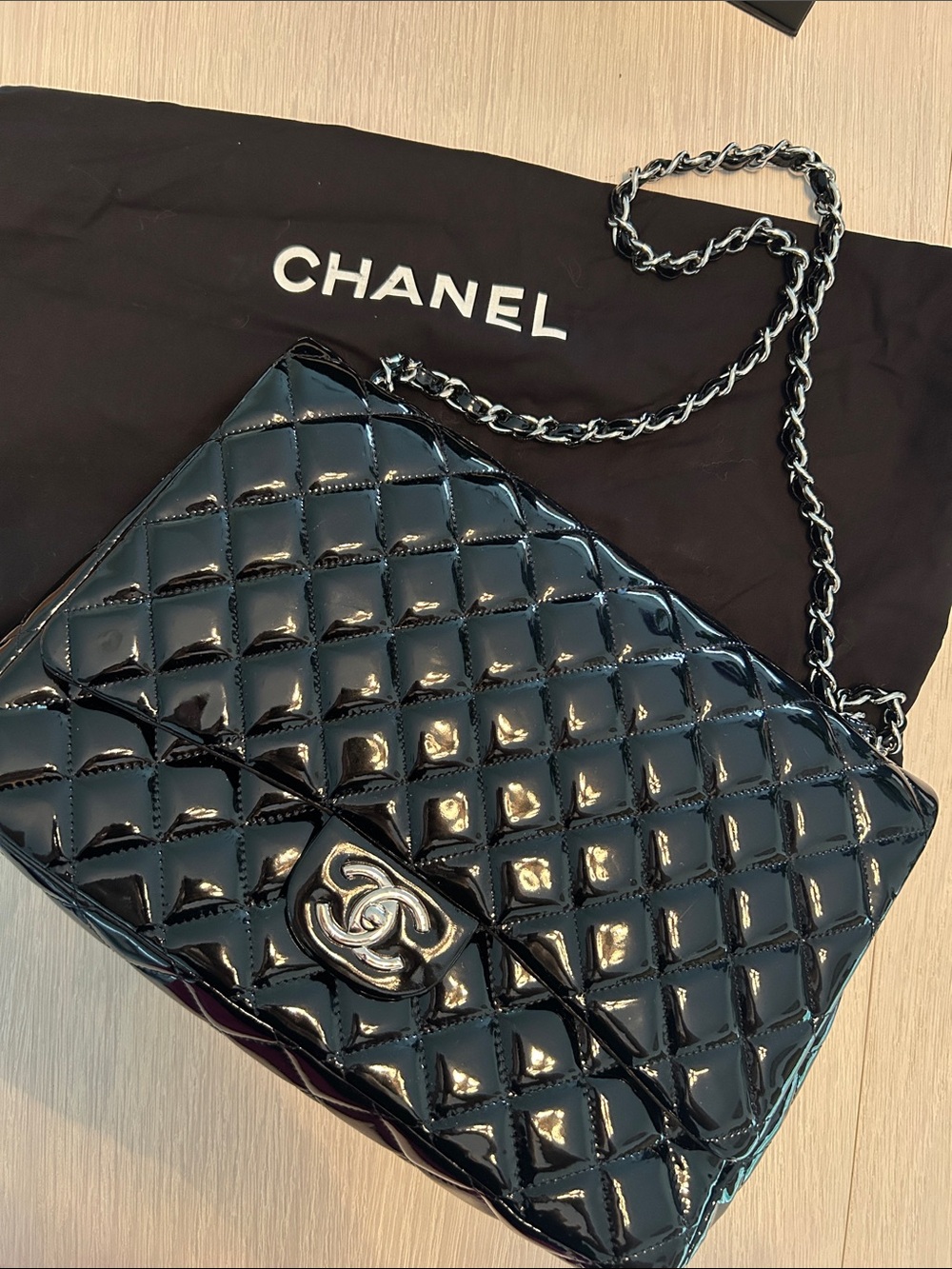 CHANEL Black Quilted Patent Leather Shoulder Bag with Silver Hardware